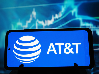 In this photo illustration, AT&T Inc. logo seen displayed on a smartphone.
