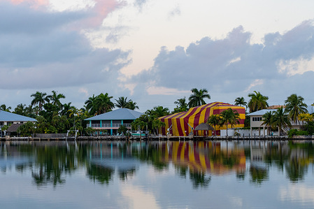 A house draped in a tent is fumigated and treated for termites, in Sugarloaf Key.