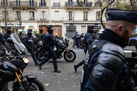 Police officers are seen during the march against gender-based and sexual violence. The Paris march against gender-based and sexual violence took place from Place de la République, organized by #NousToutes, Grève féministe, and other associations. This mobilization was part of the preparations for the International Day for the Elimination of Violence Against Women. Thousands of demonstrators—women, LGBTQIA+ individuals, and allies—came together to highlight the extent of gender-based and sexual violence in France: femicide, harassment, assault, according to the organizers judicial impunity.