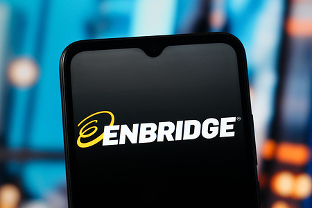 In this photo illustration, the Enbridge logo is seen displayed on a smartphone screen.