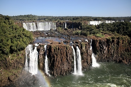 The Brazilian side of Iguazu Falls Park is pictured. Iguazu Falls are waterfalls of the Iguazu River on the border between Argentina and Brazil. They are the largest waterfall system in the world. The natural site has been listed as a United Nations Educational, Scientific and Cultural Organization (UNESCO) World Heritage Site in 1984. The site receives an average of 3 million visitors per year.