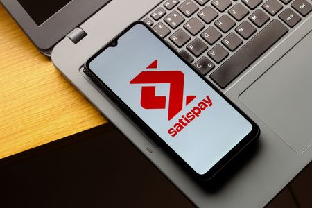 In this photo illustration, the Satispay logo is seen displayed on a smartphone screen.