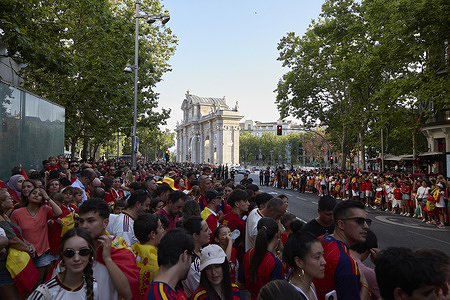 Football fans in Spain gather during the Spanish national team’s victory parade to celebrate their 2026 World Cup triumph in Madrid. Hundreds of thousands of football fans flooded the streets of Madrid during an open-top bus parade ending at Cibeles Square to celebrate the Spanish national team's historic 1–0 extra-time victory over Argentina, which secured Spain's second FIFA World Cup title.