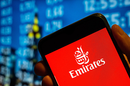 In this photo illustration, the United Arab Emirates airline logo is displayed on a smartphone screen.