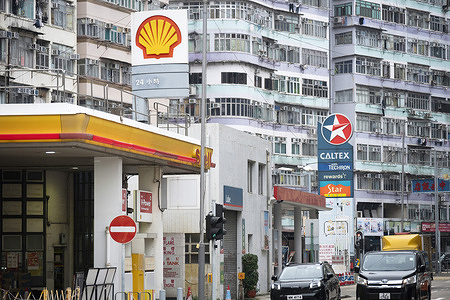 Gas stations logos from the energy and petrochemical company, Shell Oil Company, and Asian-Pacific gas and oil company Caltex, owned by Chevron Corporation, are seen in Hong Kong.