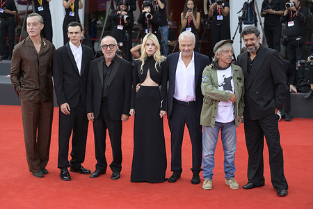 From left to right Maurizio Lombardi, Francesco Gheghi, Silvio Orlando, Alma Noce, Giovanni Veronesi, Paolo Rossi and Pierfrancesco Favino attend the red carpet of movie Dio ride during the 83rd Venice International Film Festival at Palazzo del Cinema.