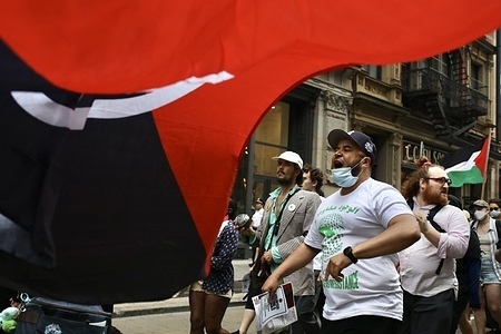 A protester chants while marching through the streets of New York during a rally for Palestine. Hundreds of demonstrators gathered in Manhattan on June 26, 2025 to demand a ceasefire in Gaza and an end to U.S. military aid to Israel.