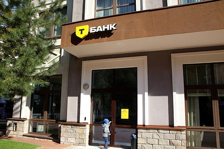 A T Bank logo seen at their branch (formerly known as Tinkoff Bank) in Krasnaya Polyana at the Krasnodar Territory, near Sochi.