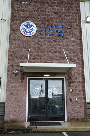 An exterior view of a U.S. Immigration and Customs Enforcement (ICE) administrative office and processing center.