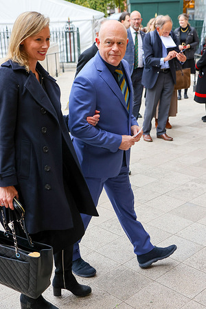 Ross Kemp (R) and his wife Renee O'Brien (L) arrive at Westminster Abbey for The National Harvest Festival Service.