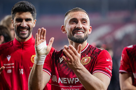 Andi Zeqiri of Widzew applauds during the Polish PKO BP Ekstraklasa League match between Widzew Lodz and Lech Poznan at Widzew Lodz Municipal Stadium. Final score; Widzew Lodz 2 : 1 Lech Poznan.