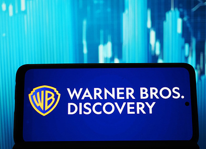 In this photo illustration, Warner Bros. Discovery, Inc. logo seen displayed on a smartphone.