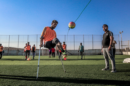 A handicapped player is seen in action.
A group of Syrian youths who have been injured and disabled as a result of the war came together and created a football team. The team has started in early 2018 and their dream is to be able to take part in the Paralympic games in 2020.