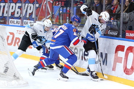 Yegor Zelenov (47) of SKA, Nikolai Salygo (58), Andrei Stas (23) of Dinamo Hockey Club seen in action during the Hockey match, Kontinental Hockey League 2025/2026 between SKA Saint Petersburg and Dinamo Minsk at the Ice Sports Palace. (Final score; SKA Saint Petersburg 4:3 Dinamo Minsk).