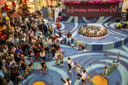 Young competitors seen waiting for their turn to take part at the Blue City mall. On Saturday the 7th of March, children took part in a Hobby Horse jumping competition at the Blue City mall in the Ochota district. Participants took part in a number of competitions throughout the day including competing for the Blue City cup.