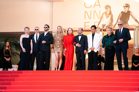 (From L) French actor Pierre Niney, Belgian actress Virginie Efira, French actress India Hair, French actress Isabelle Huppert, Iranian director Asghar Farhadi, French actress Catherine Deneuve, French actor Vincent Cassel, French actor Adam Bessa and French producer Alexandre Mallet-Guy attend the "Histoires Parallèles (Parallel Tales)" screening during the 79th annual Cannes Film Festival at Palais des Festival.
