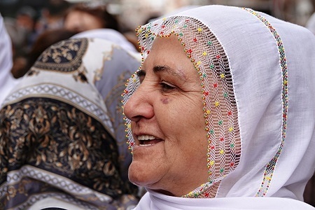 A Kurdish Peace Mother attends a press conference in Diyarbakir. In a press conference held simultaneously in several cities across Turkey, including Diyarbakir, the Kurdish Peace Mothers demanded that the Turkish government open the Mursitpinar border crossing to allow humanitarian aid trucks to pass through to Kobani in Syria. Protests against Turkey's refusal to open the border gate and allow aid trucks were also held in Istanbul, Izmir, Mardin, Van, Mersin, Adana, Batman, Siirt and Urfa provinces.