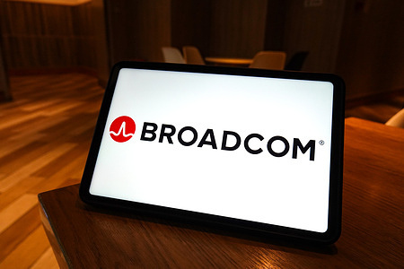 In this photo illustration, the Broadcom logo is displayed on the screen of a smart tablet.