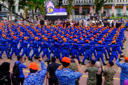 Malaysia Civil Defence Force uniform contingents march during Malaysia's 68th National Day parade rehearsal at Putrajaya. Malaysia 2025 Independence Day parade rehearsal at Putrajaya, Malaysia on 29th August.