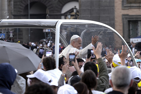 Pope Leo XIV seen leaving at the end of a meeting he had with the citizens in Piazza del Prebiscito.