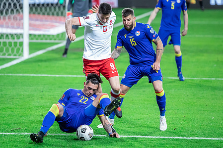 Christian Garcia of Andorra Robert Lewandowski, of Poland and Moises San Nicolas in action during the FIFA World Cup 2022 Qatar qualifying match between Poland and Andorra at Marshal Jozef Pilsudski Legia Warsaw Municipal Stadium. 
(Final score; Poland 3:0 Andorra)