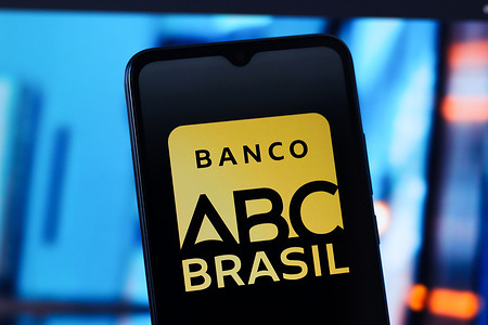In this photo illustration, the Banco ABC Brasil logo is seen displayed on a smartphone screen.