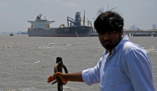Indian flagged crude oil tanker 'Desh Garima' is seen anchored at Mumbai port after crossing through the Strait of Hormuz. Indian ships carrying crude oil, LPG, and LNG that were trapped at the Strait of Hormuz due to the ongoing war between the US/Israel and Iran are being allowed to pass safely through the volatile transit route amid the blockade after the Coordination of the Indian government authorities with the Iran counterpart.