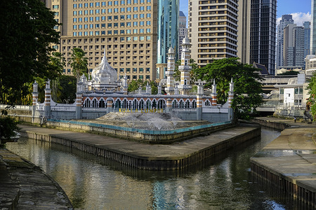 Peaceful daylight city view of Masjid Jamek seen at River of Life.