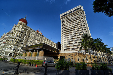 A view of the famous Taj mahal palace hotel from Gateway of India which is a Top tourist place in india . Built in 1903, the iconic Taj Mahal Palace hotel stands majestically opposite the Gateway of India, overlooking the Arabian Sea.