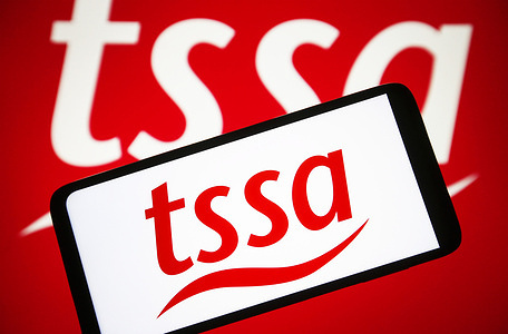 In this photo illustration, a TSSA (Transport Salaried Staffs' Association) logo is seen on a smartphone screen.