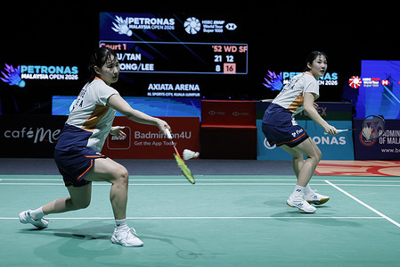 Jeong Na Eun (L) and Lee Yeon Woo of Korea play against Liu Sheng Shu and Tan Ning of China (not pictured) during the Women's Doubles semi-final match of the Petronas Malaysia Open 2026 at Axiata Arena. Liu Sheng Shu and Tan Ning won with scores; 21/21 : 8/17.