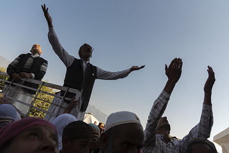Muslim devotees raise hands as they pray upon seeing the holic relic in hazratbal Shrine. Muslim devotees gathered at the Hazratbal shrine in summer capital Srinagar, which houses a relic believed to be a hair from the beard of islamic Prophet Muhammed, to offer special prayers on the occasion of the Eid-e-Milad-un-Nabi, the birth anniversary of islamic Prophet Muhammad.