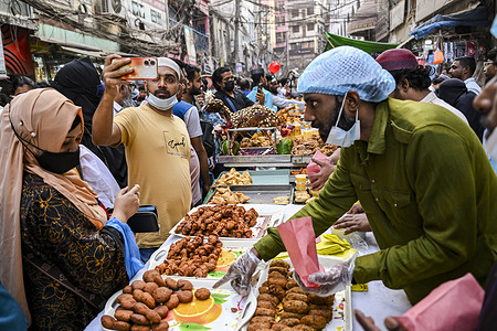 Traditional Iftar market sales, different kinds of iftars at Old Dhaka Chawkbazar in Dhaka, Bangladesh. Chawkbazar Iftar Market has been a food haven for practicing Muslims for at least 400 years, located at the heart of old Dhaka.