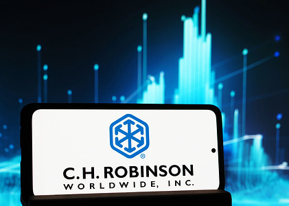 In this photo illustration, the C. H. Robinson Worldwide logo seen displayed on a smartphone.