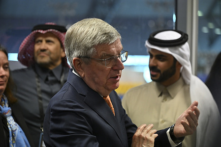 Former IOC President Thomas Bach (L) seen with Qatari officials during a visit to the Epee Fencing Grand Prix Doha 2026.