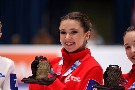 Kamila Valieva rejoices at the gold medals, at the award ceremony in figure skating, at the Russian Women's Jumping Championship 2022 in St. Petersburg, at the Yubileyny sports complex.