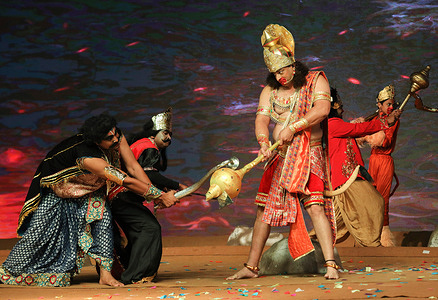 An artist dressed as Lord Hanuman (center) performs during the festival.
Ramlila performance (Ramayana: Drama on the life of Lord Ram) on the eve of the Hindu festival of Dussehra celebrations, at Lav Kush Ramlila.