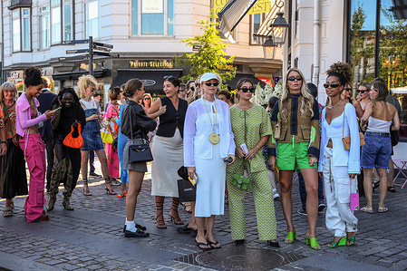 Guests seen after the fashion show of Saks Potts brand. Copenhagen Fashion Week is the biggest fashion event in the King's New Square, Scandinavia. This summer Fashion Week runs from 9th to 12th August. On the streets of the capital of Denmark a lot of fashionably dressed people.