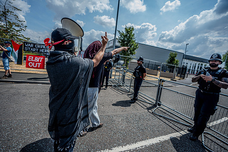 (EDITOR'S NOTE: Image contains profanity)
Pro-Palestinian protestors are stopped by a cordon of Police officers during a protest outside Elbit Systems weapons factory. Pro-Palestinian protestors gathered outside Elbit Systems factory in Filton, Bristol to accuse the arms company of supplying Israel with weaponry and drones for its war in Gaza.