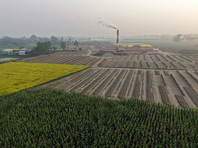 An aerial view of an unplanned brickfield in Jamalpur, destroying fertile farmland while polluting the environment and threatening local livelihoods and ecosystems.
