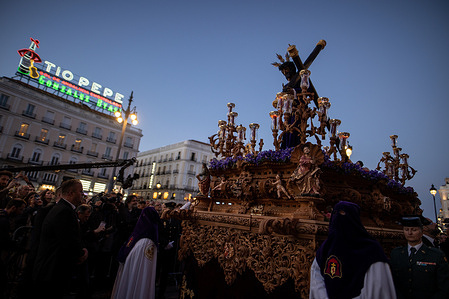 A figure of Christ carrying a cross seen being carried through the city. During the Holy Wednesday procession of the Brotherhood of the Gypsies featuring the images of Our Father Jesus of Health and Our Lady of Sorrows.