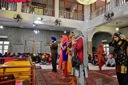 Sikh devotees seen praying inside the gurdwara or a Sikh temple during the festival.
Baisakhi, marks the Sikh New Year and is also celebrated as harvest festival in many northern states of India.