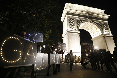 People converge with signs on Washington Square Park to celebrate President Trump's presumed defeat in the Presidential election.
With a handful of states making final vote tabulations, celebrants are optimistic of the Biden/Harris ultimate win.
