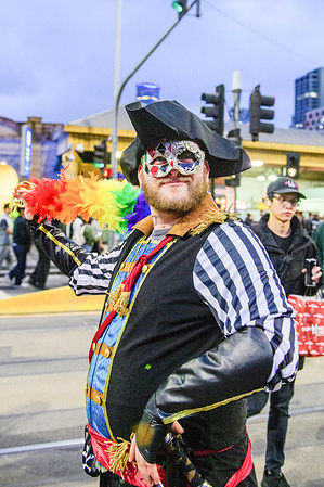 A costumed reveller poses for a photograph among New Year's Eve crowds in Melbourne's CBD. Large crowds filled the Melbourne CBD on New Year’s Eve 2025 as revellers gathered in public spaces, entertainment precincts, and transport hubs to celebrate the arrival of the New Year. Trams and trains carried passengers late into the night as people moved between events and social gatherings. Despite a strong security presence, the atmosphere across the city remained relaxed as Melbourne residents and visitors marked the end of the year.