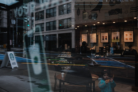 A customer seen eating food inside Starbucks Seattle downtown with a sign displaying the Starbucks logo on the street. Starbucks has announced the closure of its store located at Broadway and Denny in Capitol Hill, Seattle, due to "safety and security incidents." The location, which was the first Starbucks store to unionize in Seattle, has sparked controversy among employees who claim that the closure is a result of union-busting tactics. Workers United, the employees' union, argues that the closure is scheduled on the anniversary of the union's formation last year, and the Capitol Hill store is the fourth unionized Seattle location to close. In response, Starbucks denies these allegations and states that they have made several attempts to resolve the issues at the store but closing it was the only option to ensure the safety of staff and customers. A Starbucks spokesperson stated, "At Starbucks, we make every effort to ensure our partners feel safe and supported at work so they can focus on providing our customers the safe, welcoming experience they’ve come to love and expect. Unfortunately, despite several mitigating efforts, safety and security incidents at our Broadway and Denny store have continued to escalate. As a result, we will be closing our Broadway and Denny store to customers on December 9, 2022."
The closure of Starbucks' Capitol Hill location has caused concern among employees and customers alike, with some accusing the company of union-busting and others raising questions about the company's commitment to ensuring safety in the workplace.
