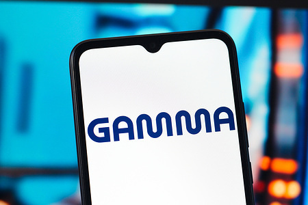 In this photo illustration, the Gamma Tech logo is seen displayed on a smartphone screen.