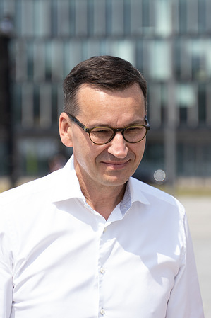 MP PiS, former Prime Minister Mateusz Morawiecki seen during the Corpus Christi procession. Corpus Christi, the feast of the Most Holy Body and Blood of Christ, is celebrated in Poland. For Catholics, this is a special and joyful holiday - it reminds us of the Last Supper and the transformation of bread and wine into the Body and Blood of Christ. In Warsaw after the solemn Holy Mass. in the Archcathedral Basilica of St. John the Baptist, a procession passed through the streets of the city. The procession stopped at the altars placed by residents in front of the churches.