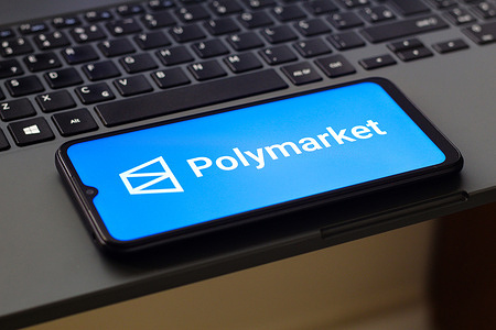 In this photo illustration, the Polymarket logo is seen displayed on a smartphone screen.