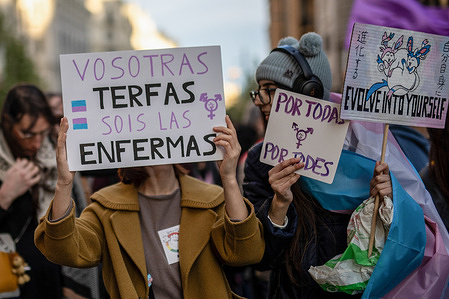Protesters hold placards expressing their opinion during the demonstration. The demonstration against attacks on LGBTQIA+ people held in Plaza Pedro Zerolo, Madrid.