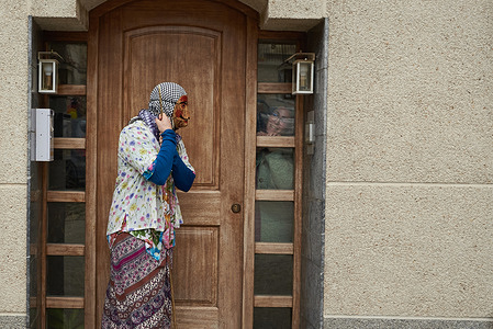A woman with mamuxarro costume, a typical character of the rural carnival of Unanua, waits for the young people of the town to come out so she can chase them with her hazelnut stick to beat them through the town during the carnival of Unanua. The Navarrese ancestral carnival is a ritual related to purification and fertility, killing the old and giving life to the new.
